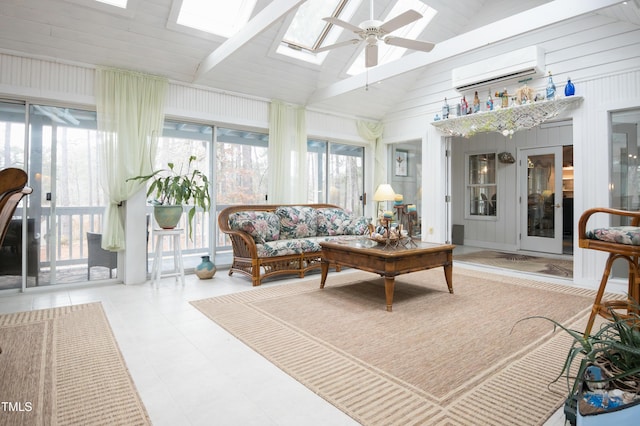 sunroom with a wall mounted air conditioner, vaulted ceiling with skylight, and ceiling fan