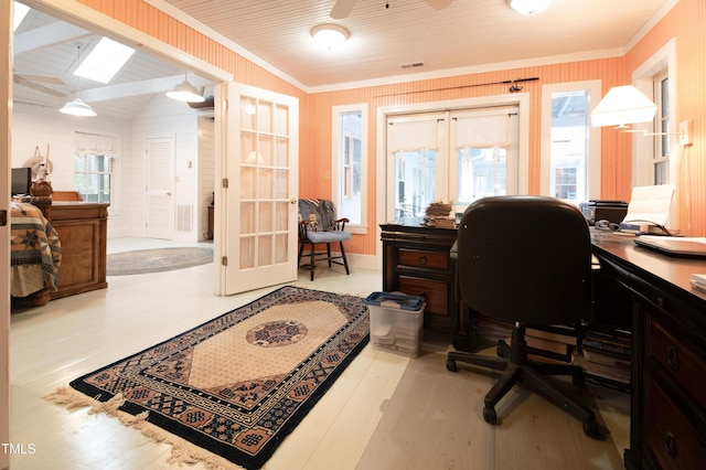 office area featuring french doors, ceiling fan, ornamental molding, and vaulted ceiling