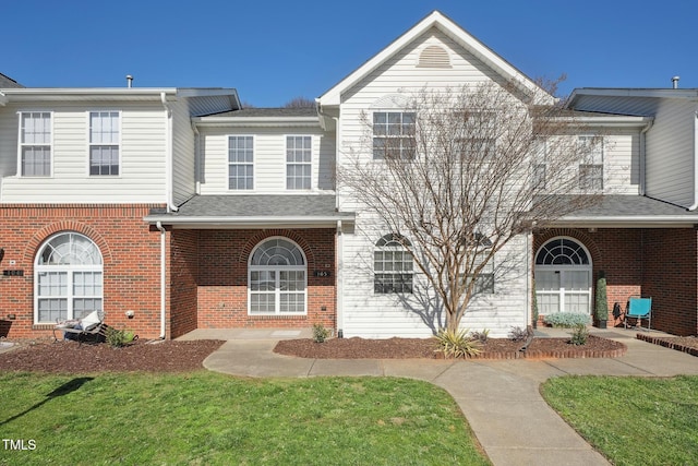 view of front of home with a front yard