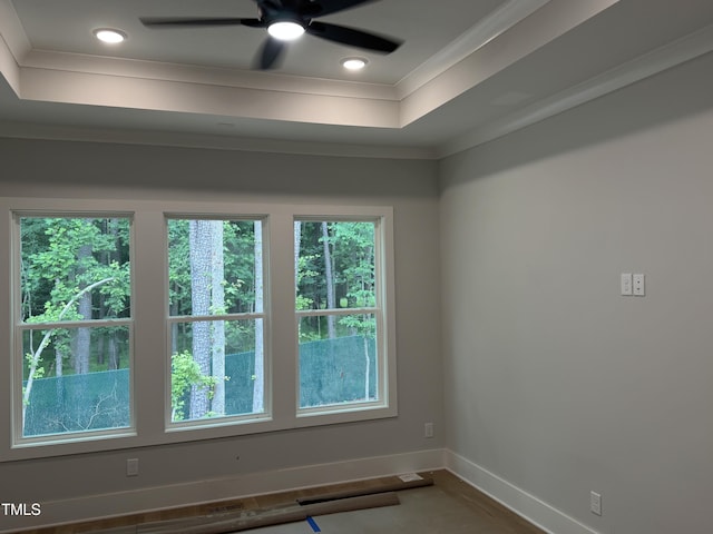 118 Sanderway Dr, Chapel Hill, NC 27516 - empty room featuring crown molding, a raised ceiling, and a ceiling fan