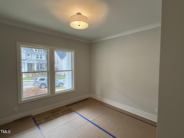 118 Sanderway Dr, Chapel Hill, NC 27516 - spare room featuring crown molding and baseboards