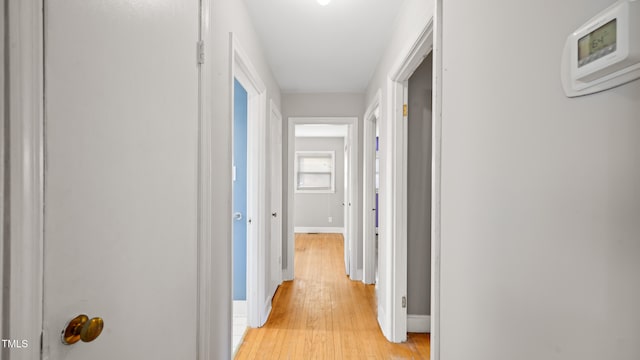 hallway featuring light hardwood / wood-style floors