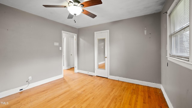 unfurnished bedroom featuring light hardwood / wood-style floors and ceiling fan