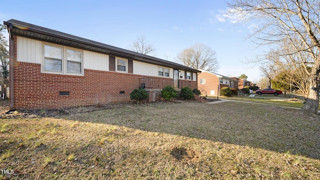 view of property exterior featuring a yard