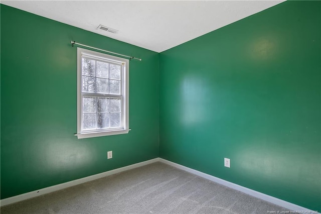 unfurnished room featuring carpet flooring