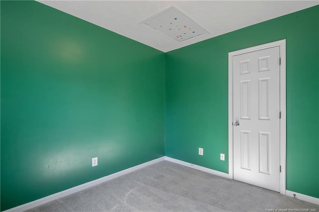 spare room with light carpet