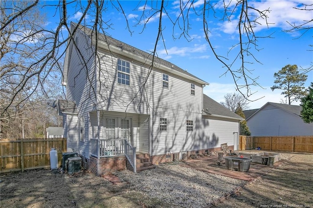 rear view of property with a patio