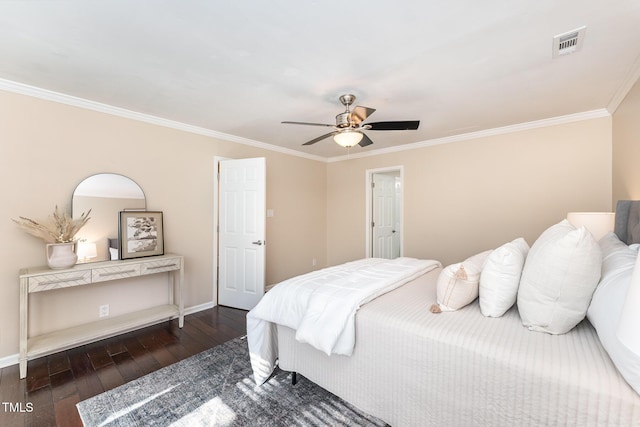 bedroom featuring dark wood-type flooring, ceiling fan, and crown molding