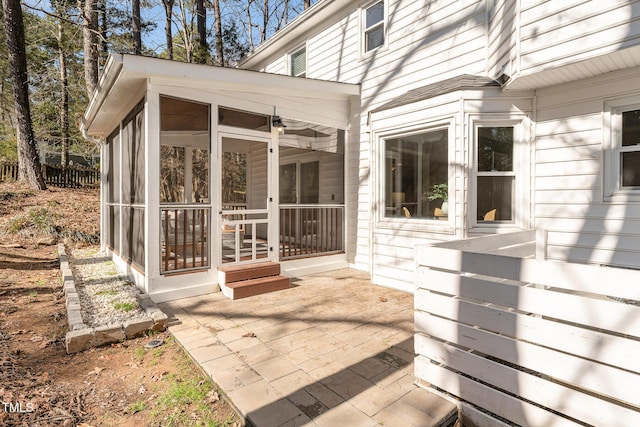 view of patio / terrace with a sunroom