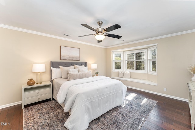 bedroom featuring crown molding, dark hardwood / wood-style floors, and ceiling fan