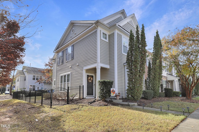 view of front of property with a front yard