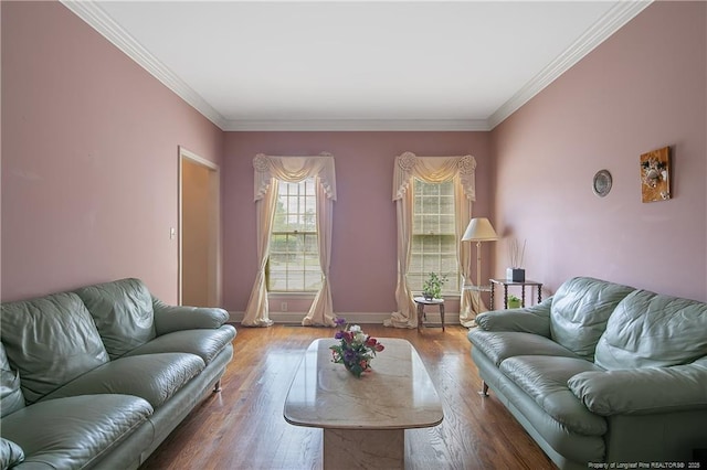 living room with crown molding and light hardwood / wood-style floors