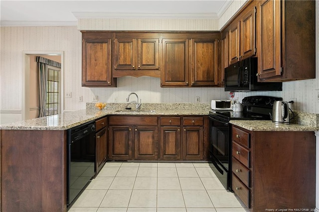 kitchen featuring black appliances, sink, ornamental molding, kitchen peninsula, and light stone countertops