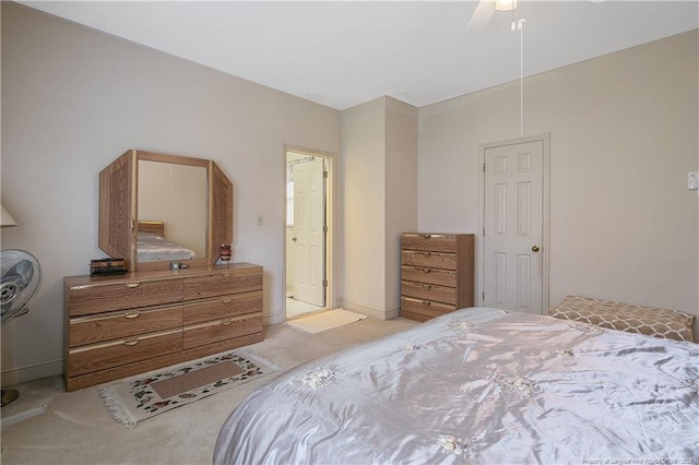 bedroom with light carpet and ceiling fan