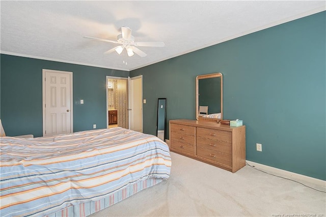 carpeted bedroom featuring crown molding and ceiling fan