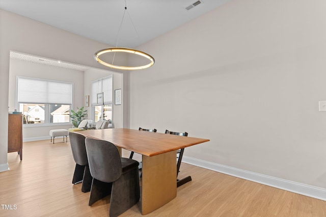 dining room featuring light wood-type flooring