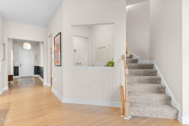 foyer entrance featuring hardwood / wood-style floors