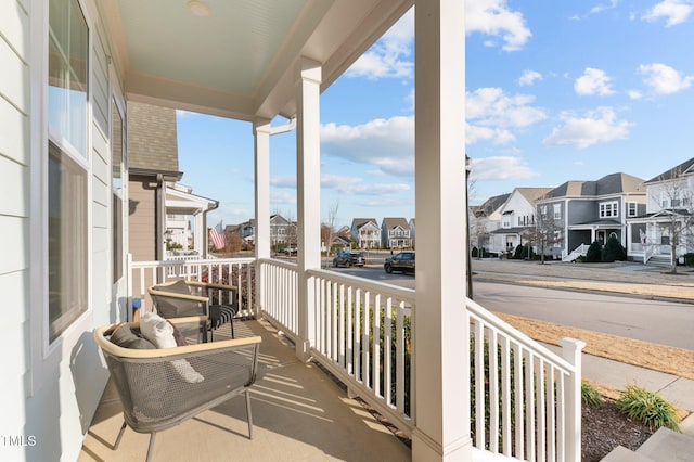 balcony featuring a porch