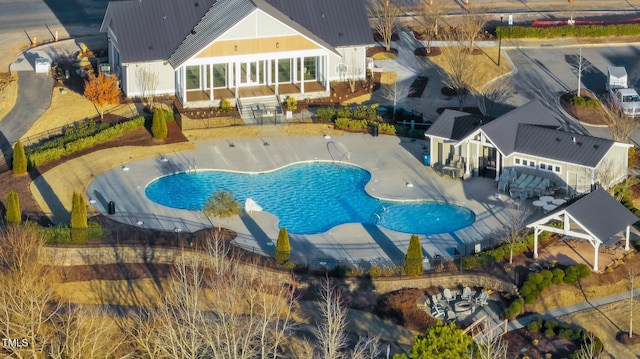 view of swimming pool featuring a patio