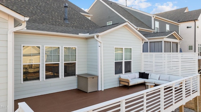 wooden terrace featuring an outdoor hangout area