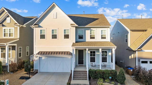 view of front of home featuring a garage and covered porch