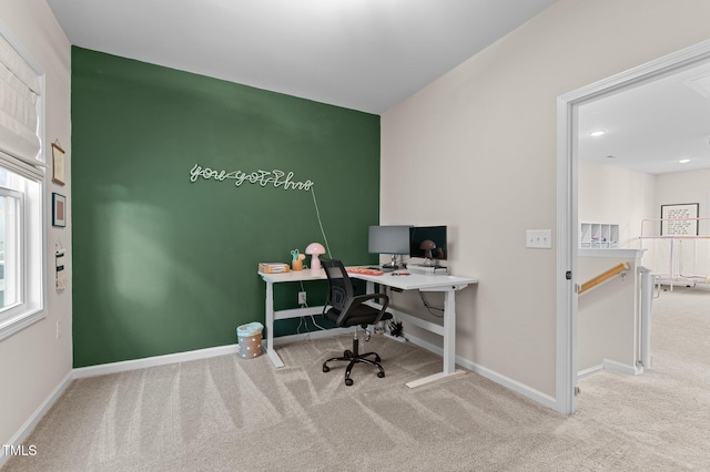 office area with light colored carpet