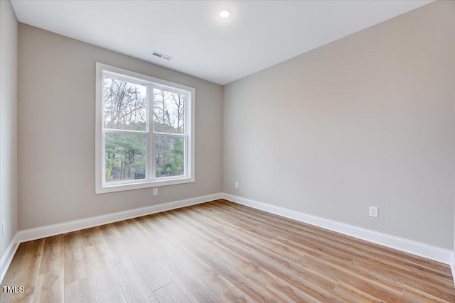 empty room featuring light hardwood / wood-style floors