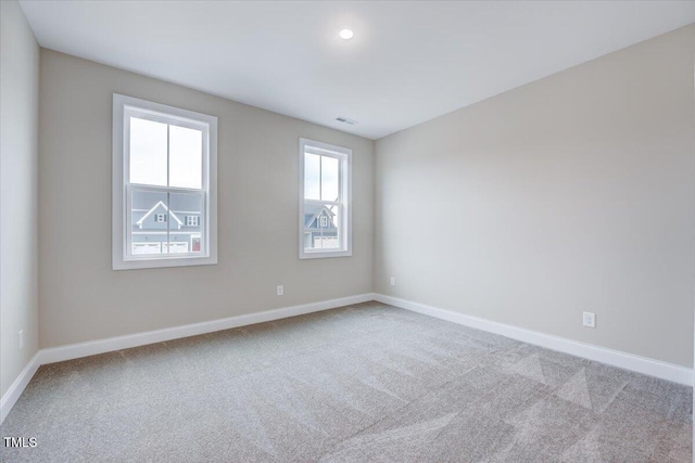 view of carpeted spare room