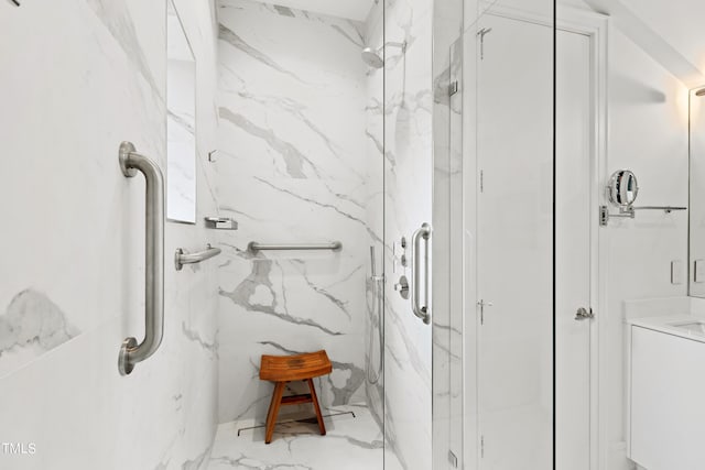 bathroom with vanity and an enclosed shower