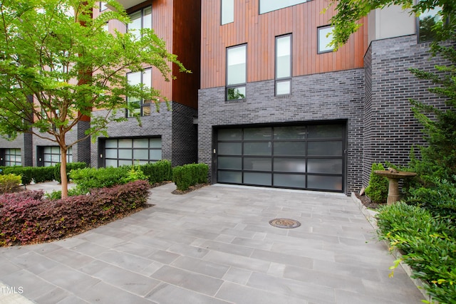 exterior space with a garage