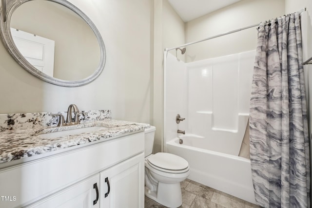 full bathroom featuring vanity, shower / tub combo with curtain, and toilet