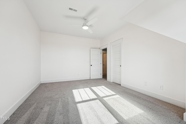 additional living space featuring carpet floors and ceiling fan