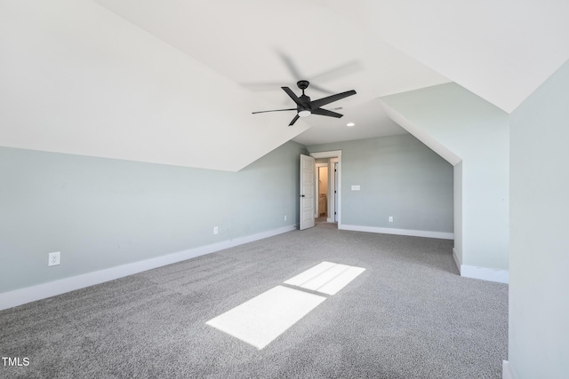 bonus room featuring ceiling fan, carpet flooring, and vaulted ceiling