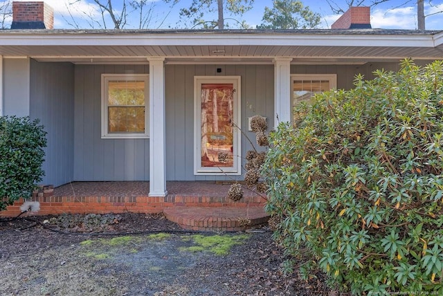 property entrance featuring covered porch