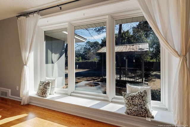 details featuring hardwood / wood-style flooring