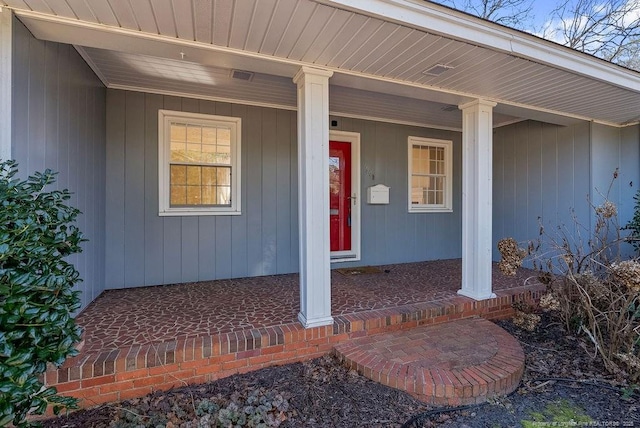 entrance to property with a porch