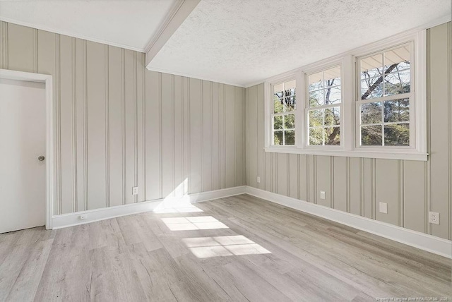 509 Vista Dr, Fayetteville, NC 28305 - empty room featuring wood finished floors, baseboards, and a textured ceiling