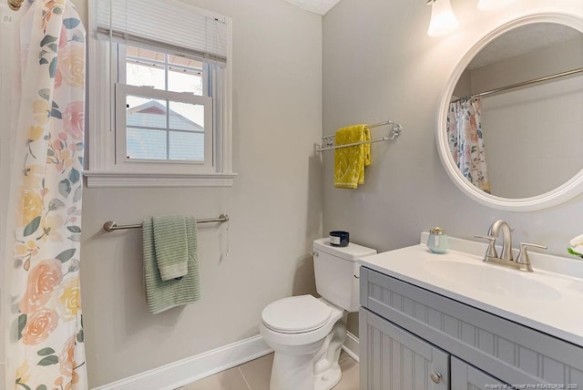 509 Vista Dr, Fayetteville, NC 28305 - full bathroom with baseboards, toilet, tile patterned flooring, vanity, and curtained shower