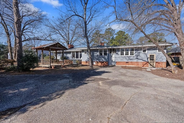 509 Vista Dr, Fayetteville, NC 28305 - single story home featuring a chimney, asphalt driveway, and crawl space