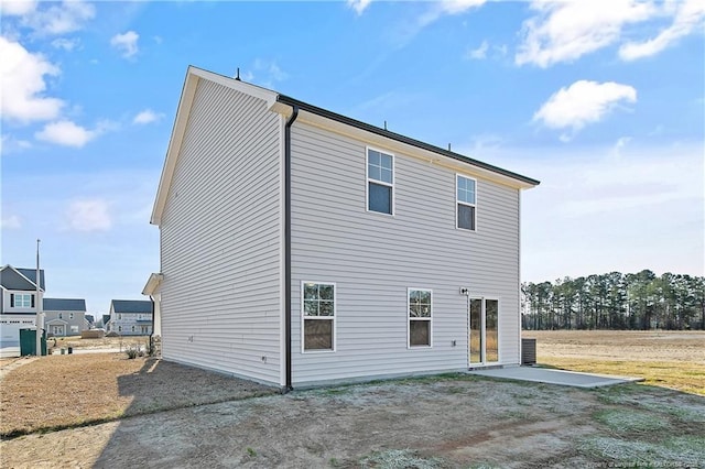 rear view of property with a patio area