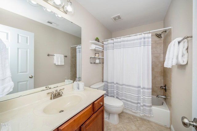 full bathroom with tile patterned flooring, vanity, shower / tub combo, and toilet