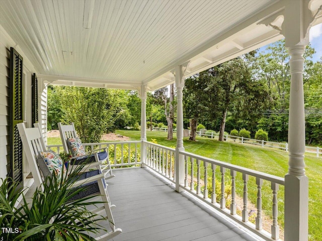 967 Bynum Rd, Pittsboro, NC 27312 - wooden porch featuring view of scattered trees and a yard