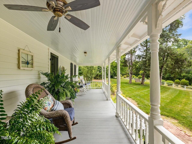 967 Bynum Rd, Pittsboro, NC 27312 - wooden porch with a lawn and ceiling fan