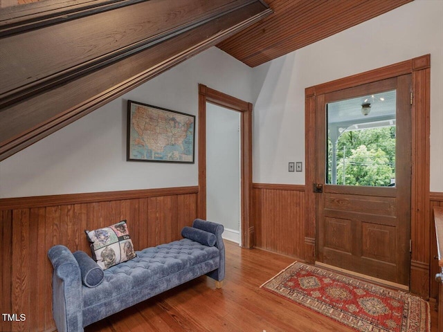 967 Bynum Rd, Pittsboro, NC 27312 - foyer entrance featuring wainscoting, lofted ceiling, wood finished floors, and wood walls
