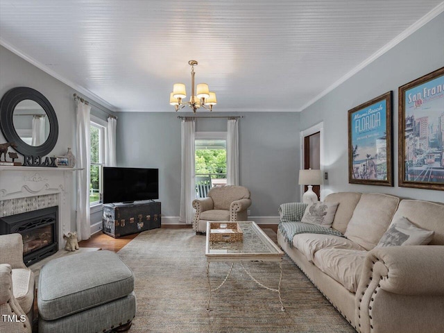 967 Bynum Rd, Pittsboro, NC 27312 - living area with a chandelier, plenty of natural light, wood finished floors, crown molding, and a high end fireplace