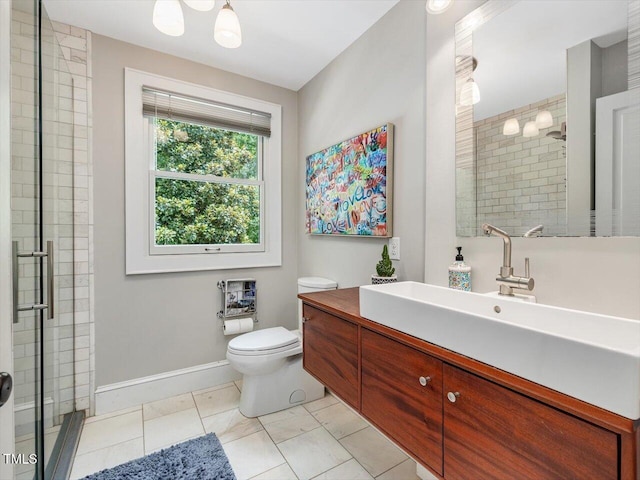 967 Bynum Rd, Pittsboro, NC 27312 - bathroom with vanity, a shower stall, toilet, baseboards, and marble finish floors