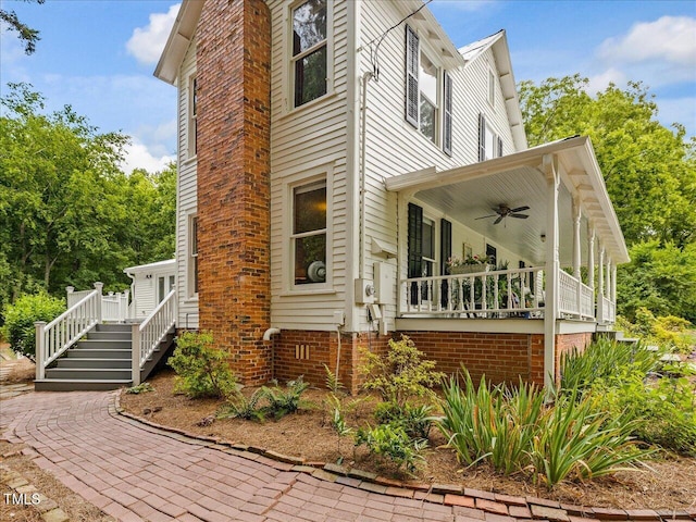 967 Bynum Rd, Pittsboro, NC 27312 - view of home's exterior with a ceiling fan and a porch
