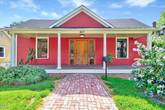 bungalow featuring covered porch