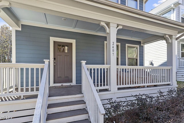 entrance to property with a porch