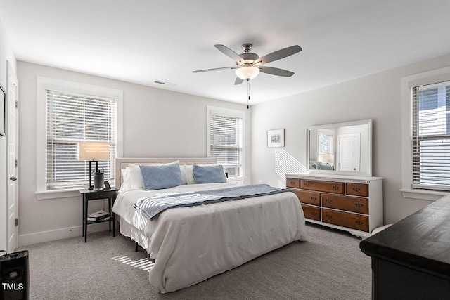 carpeted bedroom featuring ceiling fan